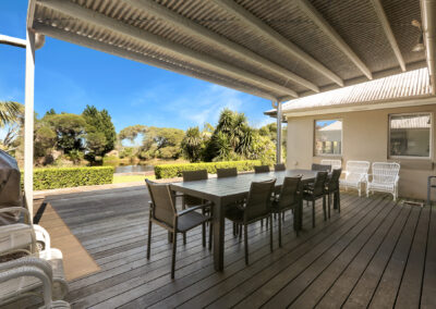 Outdoor eating area on the deck overlooking west of the lake